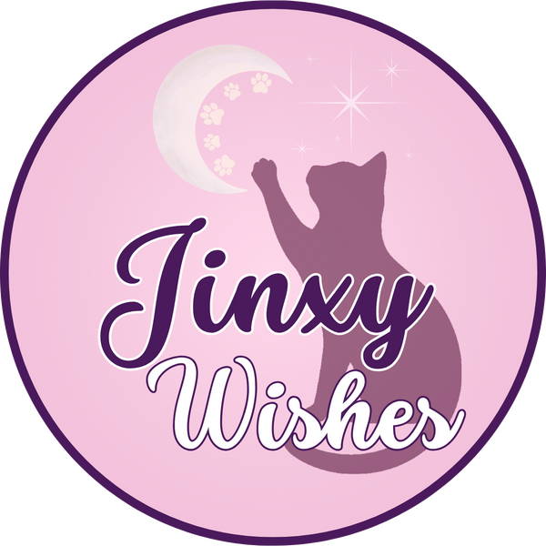 Circular logo with a cat silhouette, moon, and stars on a pink background with 'Jinxy Wishes' text.