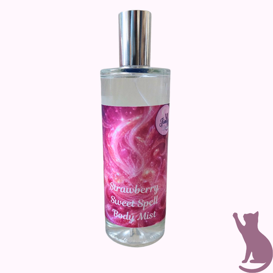 A bottle of Strawberry Sweet Spell Body Mist with a pink and purple marbled label and a silver cap, shown on a light pink background with a purple cat silhouette logo in the bottom right corner.